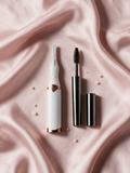 Lily Lash heated eyelash curler and Magic Mascara on blush silk